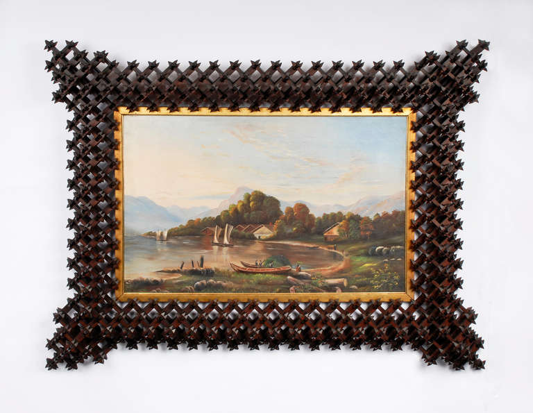 Wonderful impressive Crown of Thorns frame with an oil painting of a lush river scene. The frame is sturdy and well made and extremely rare in this size and condition. The oil painting is original to the frame. The frame was found in NJ and dates to