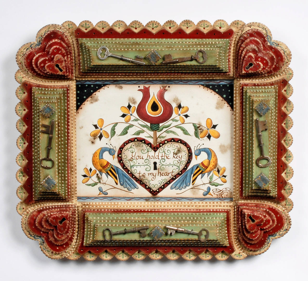 A fine 'Key to My Heart' tramp art frame by contempoary artist Angie Dow with a fluid watercolor of birds, hearts and flowers.