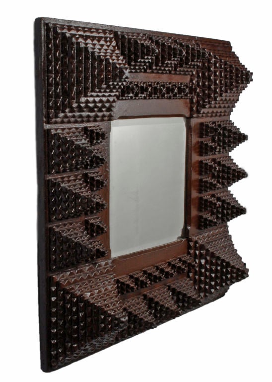 Robust Tramp Art Mirror with Bold Geometric Patterning
