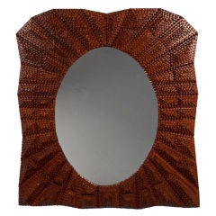 Fanciful Oval Opening Tramp Art Mirror with Strong Patterning