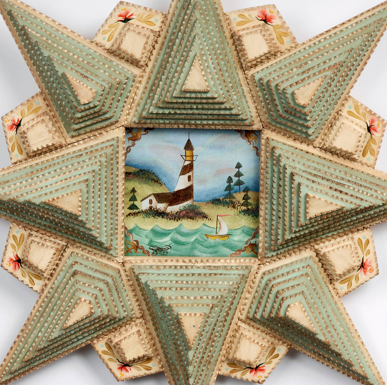 A wonderful detailed 'Sea Glass' Tramp Art star-shaped painted frame with a nautical themed painting by noted contemporary artist Angie Dow.