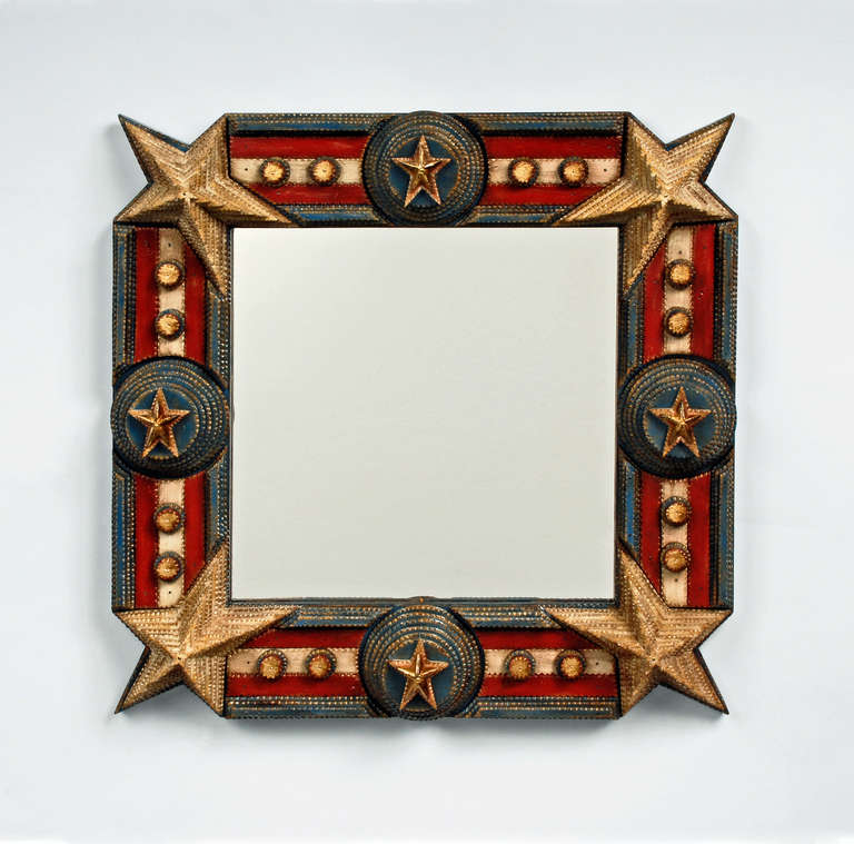A fine tramp art stars and stripes tramp art mirror by noted tramp artist Angie Dow.