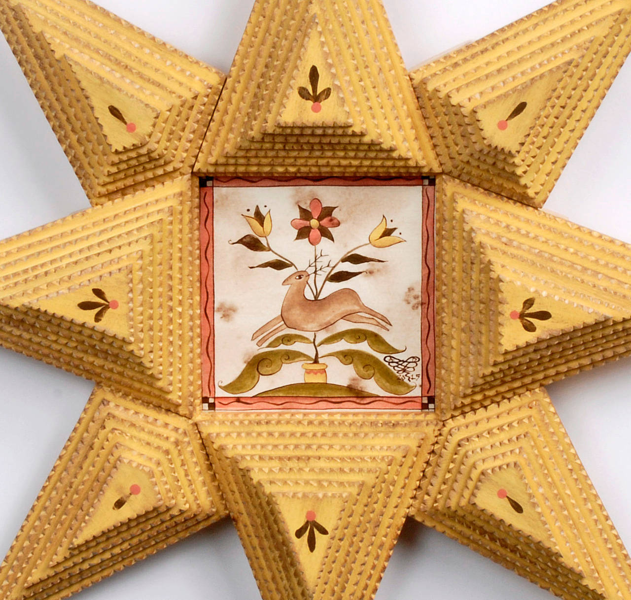 A vibrant star-shaped Tramp Art frame with a painting titled, 'Leaping Stag' by noted contemporary artist Angie Dow.