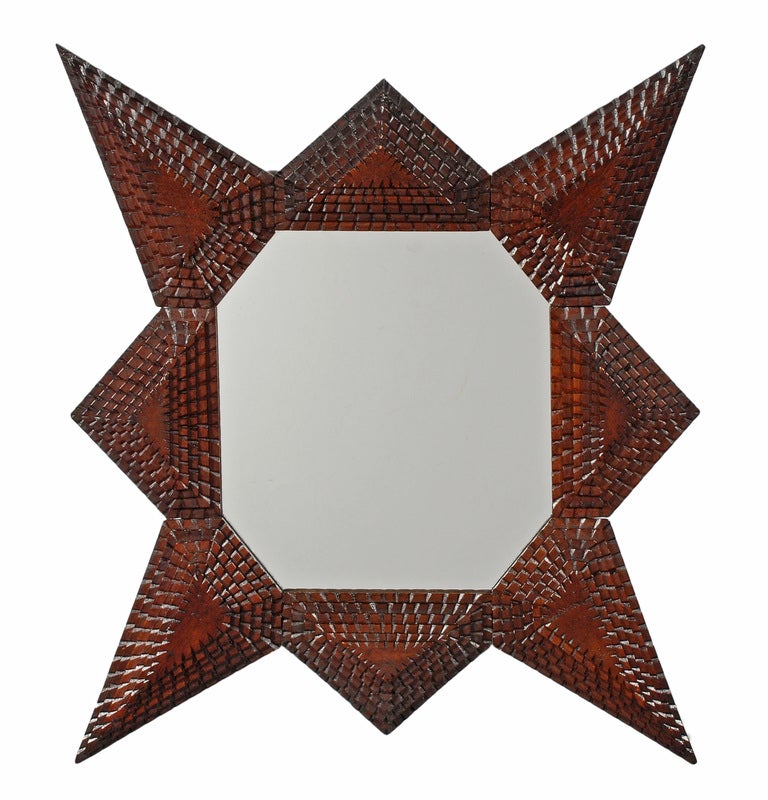 Fine tramp art star shaped mirror.