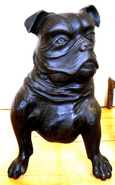 Dynamic pair of cast iron bulldogs in original black paint.  Bold, finely cast details.<br />
Strong presence.  Unlike most opposing andirons, each bulldog is separately designed<br />
and cast, with its own unique features.