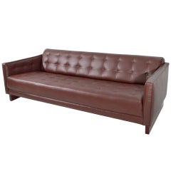 Tufted brown leather sofa with Rosewood base by Milo Baughman