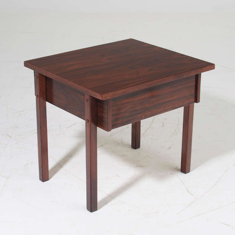 A petite Brazilian exotic hardwood side table or end table with a single drawer.

 
