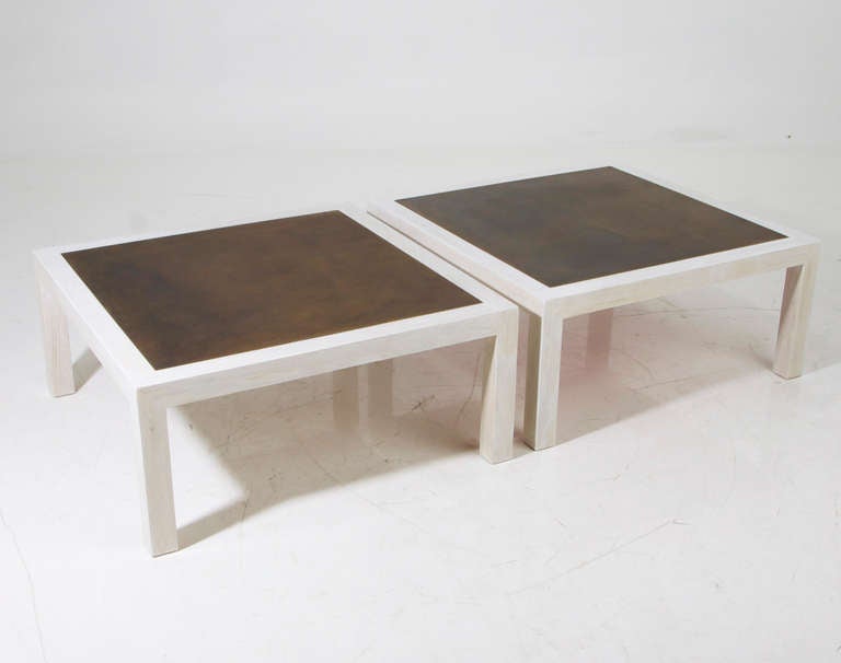 Square tables by Harry Lunstead with solid bleached oak frames and acid-etched bronze tops that can function as small coffee tables or a large rectangular coffee table when put side by side. Price is per table.

Many pieces are stored in our