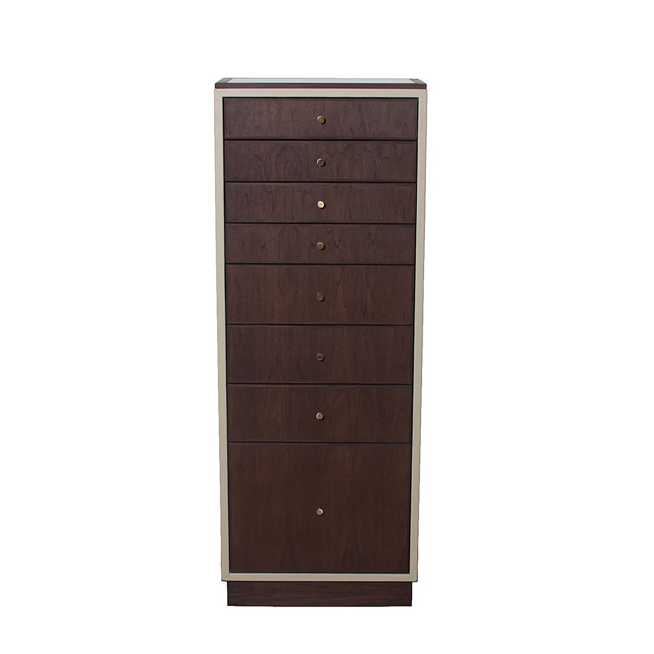 An elegant, tall, 8-drawer Walnut jewelry chest wrapped in faux leather and featuring a capiz shell inlay top. The drawers are wood veneer with solid edge banding. 

This item is available for custom order and the lead time is 6-8 weeks; sometimes