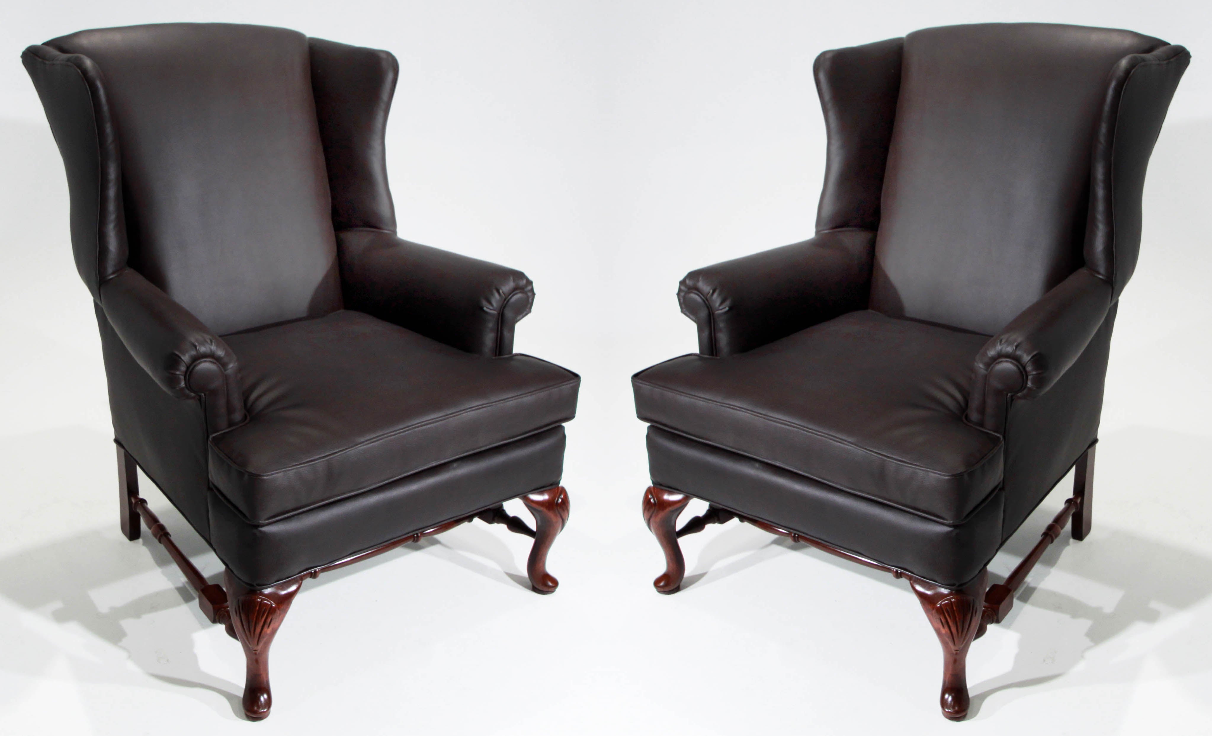 Pair of Large Winged Armchairs For Sale