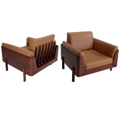 Pair of spined Rosewood lounge chairs by Jorge Zalszupin