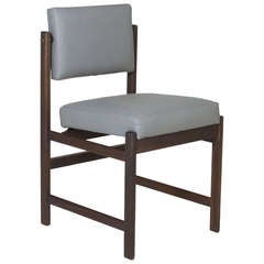 The Basic Pivot Back Dining Chair in Solid Walnut and Charcoal Oil Finish