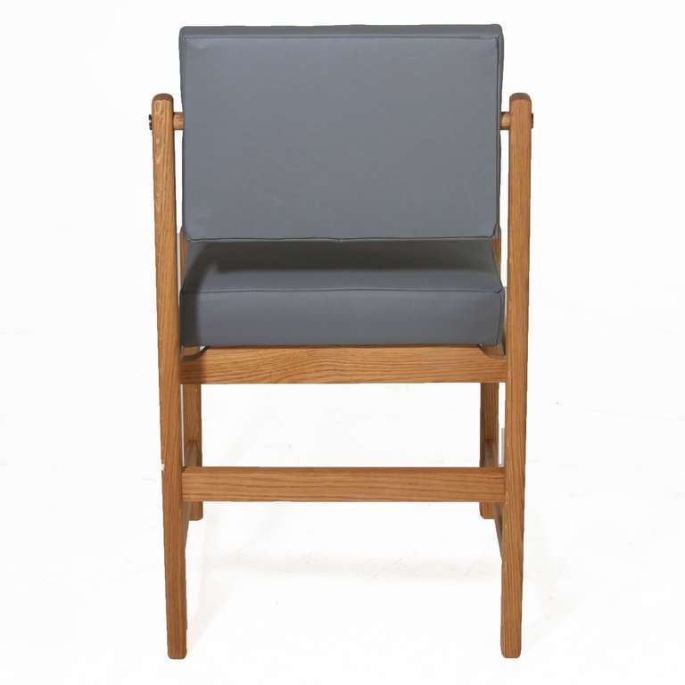 The Basic Pivot Back Dining Chair in Solid Oak in Pure Oil Finish In Excellent Condition In Hollywood, CA
