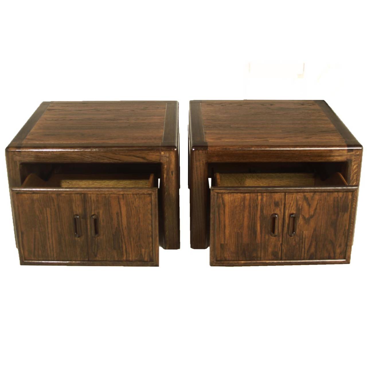 This solid pair of Oak California Craftsman end tables has been refinished in a medium stain and lacquer finish.

 