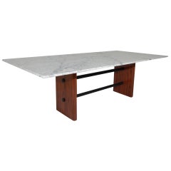 Rosewood and solid metal double-stretcher table with marble top