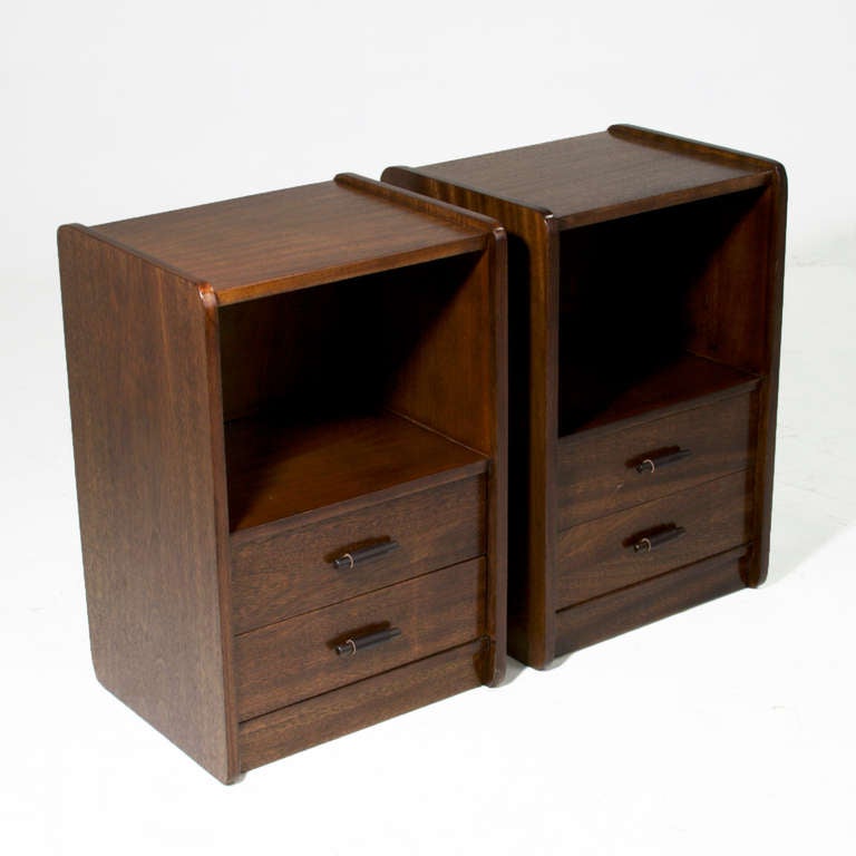 A pair of exotic Brazilian hardwood night stands or end tables with 2 drawers, open shelves, and solid Rosewood pulls wrapped in leather. 

Many pieces are stored in our warehouse, so please click on CONTACT DEALER under our logo below to find out