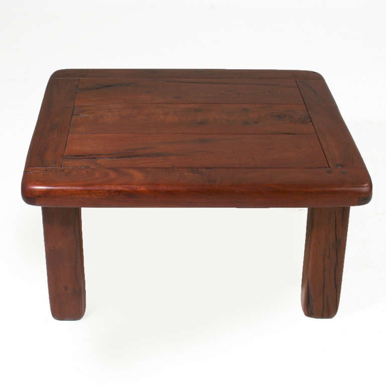 A solid Ipe wood side table with rounded edges and massive solid legs. The Ipe was salvaged from vintage railroad planks, and retains nail holes, cracks and variation in grain that only adds to the appeal of this unique table.



 