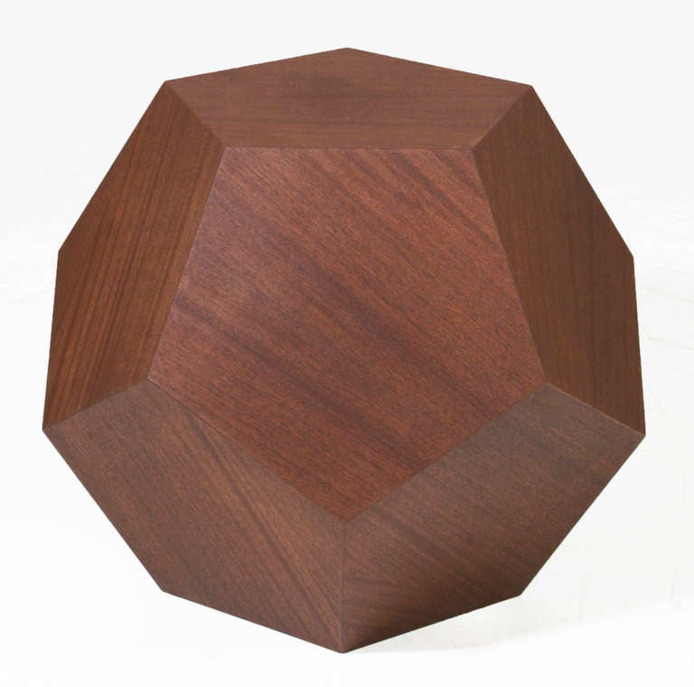 The Dodecahedron side table by Thomas Hayes Studio. The geometric design features 12 pentagons seamlessly attached to one another to form the 3 dimensional dodecahedron.

This item is available for custom order and the lead time is 6-8 weeks;