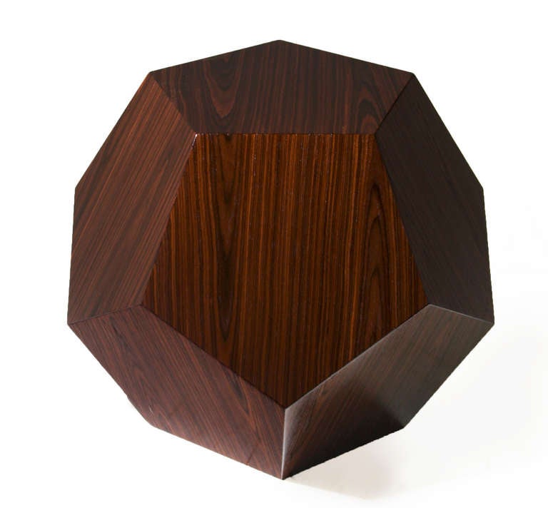 The Dodecahedron side table by Thomas Hayes Studio. The geometric design features 12 pentagons seamlessly attached to one another to form the 3 dimensional dodecahedron.

 This item is available for custom order and the lead time is 6-8 weeks;