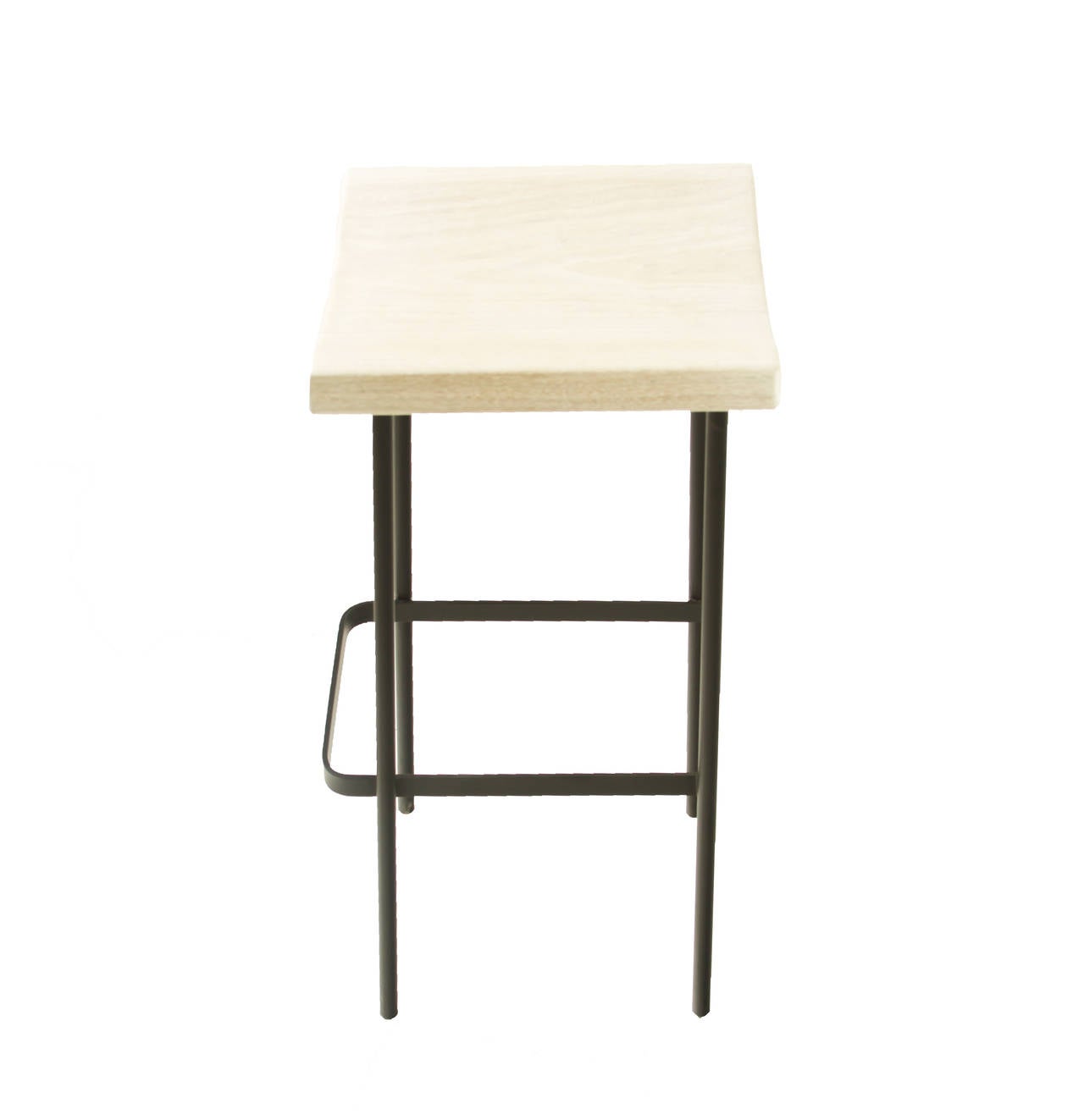 The Bundinha Stool by Thomas Hayes Studio with flat black finished frames and solid wood hand-carved tops and a curved flat bar foot rest. 

This item is available for custom order and the lead time is 6-10 weeks; sometimes we are able to complete
