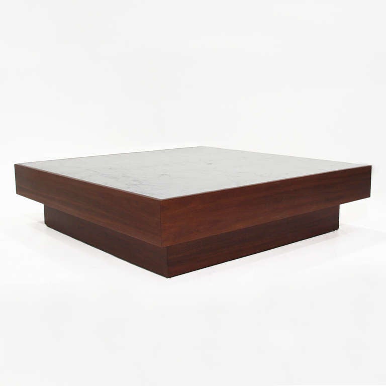 Custom walnut low, square coffee table by Thomas Hayes Studio with inset white Carrara marble top. Available for custom order in a variety of wood, finishes and leathers.

This item is available for custom order and the lead time is 6-8 weeks;