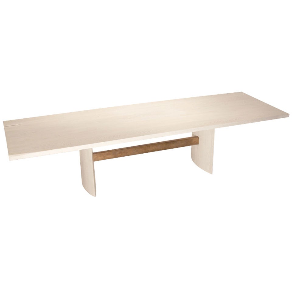 The Jantar Alloy Dining Table in bleached Oak by Thomas Hayes Studio