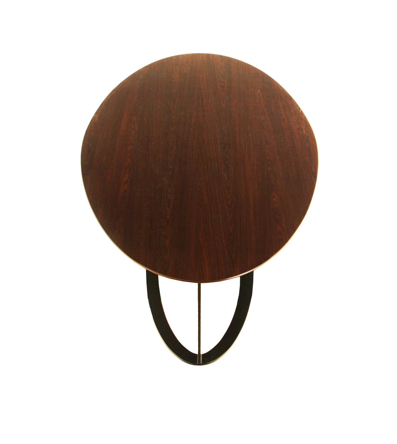 A vintage oval table of Rosewood from Brazil with a new base of solid bronze finished laser cut steel. The bronze finish is an almost-black powder coat.

Many pieces are stored in our warehouse, so please click on CONTACT DEALER under our logo