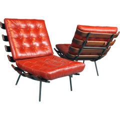 Pair of Martin Eisler "Bone" chairs in red leather