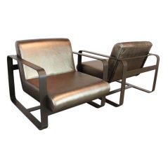 Pair of Cantilevered bronze lounge chairs