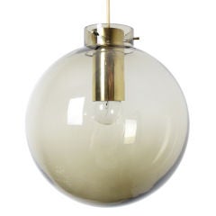 Large brass 
tinted glass globe pendant by Fog 
Morup
