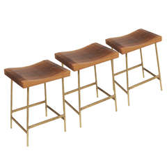 Used The Brass Bunda Bar Stool in Walnut by Thomas Hayes Studio