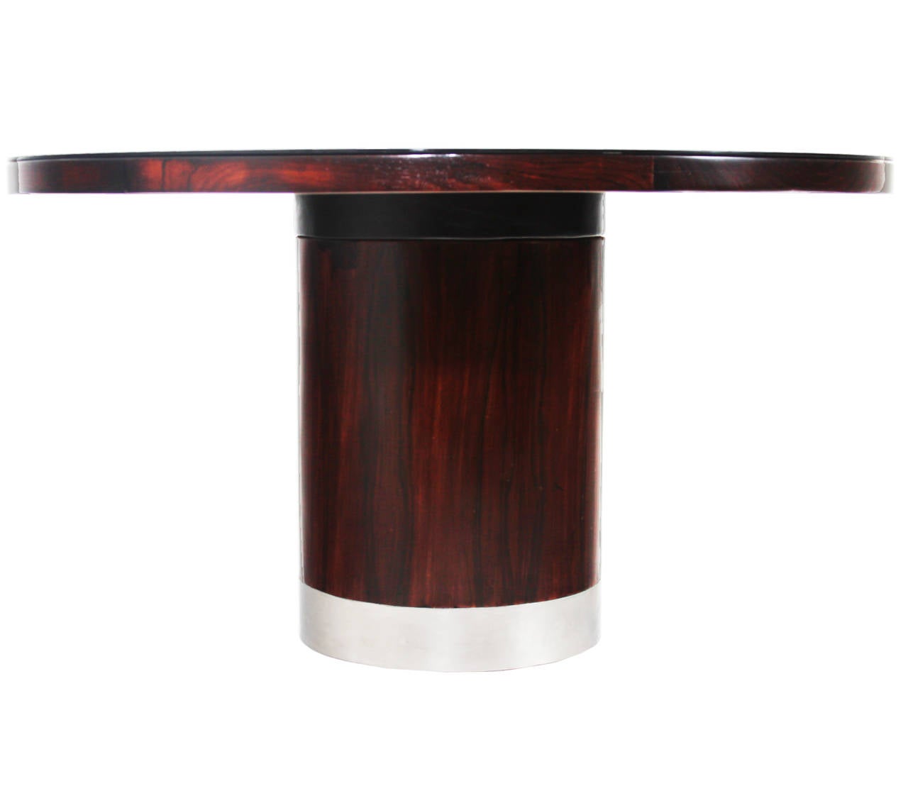 A beautiful rosewood dining table by Brazilian designer Sergio Rodrigues with black glass top. The base has a 4