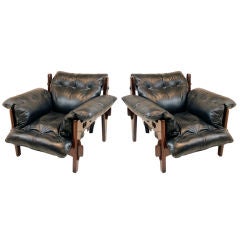 Two "Poltrona Moleca or "Mischevious chairs" by Sergio Rodrigues