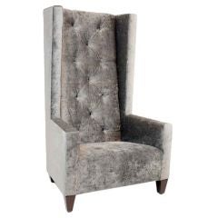 Single high back tufted gray silk velvet chair.