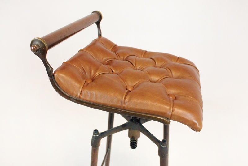 Set of 3 bronze and tufted leather bar stools from Brazil 3