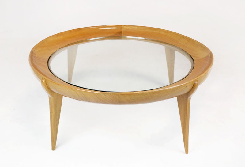 A round solid Caviuna coffee table with sculptural legs and an inset glass top designed by Brazil's Giuseppi Scapinelli. A similar larger coffee table is also available.

Many pieces are stored in our warehouse, so please click on CONTACT DEALER