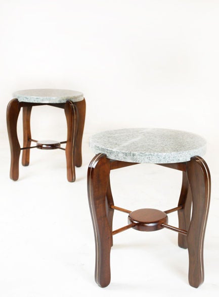 A pair of sculptural solid rosewood side tables with white/gray granite tops from Brazil.

 