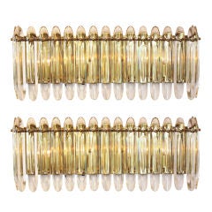 Pair of  horizontal cut glass and brass sconces