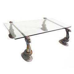 Coffee table made with solid bronze sculptural bases