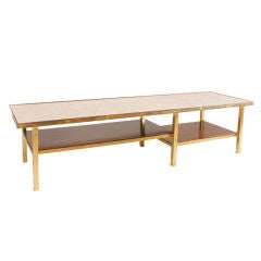 Brass, marble, and rosewood coffee table By Harvey Probber