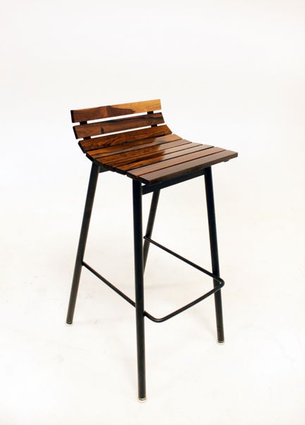 A set of 2 bar stools by Thomas Hayes Studio with beautiful old growth rosewood slats from Brazil. Frames are steel powder coated in a matte black finish. Price of $1,350 is per stool.

WOOD OPTIONS:
Walnut, Oak, Mahogany, or Rosewood

FINISH