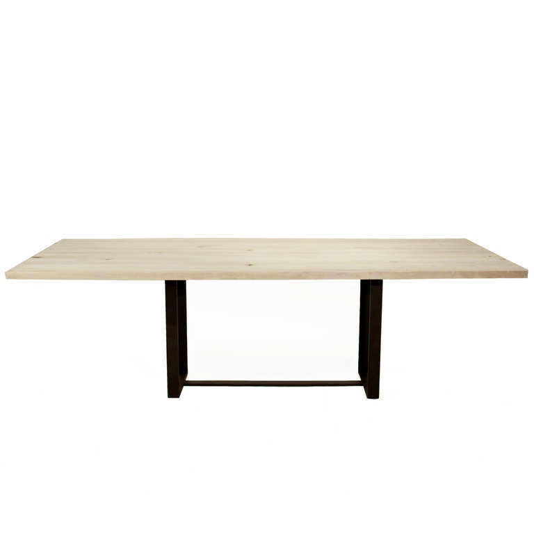 A custom order solid laminated wood slab dining table by Thomas Hayes Studio with architectural flat bar steel base. This table shown in available for immediate purchase. 

It is available for custom order in other sizes, woods and finishes. Lead