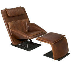 Saporiti Distressed Brown Leather Chair And Ottoman