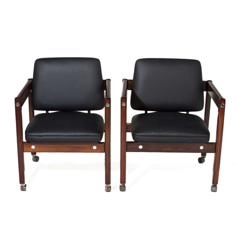 A pair of exotic Brazilian hardwood and black leather Sergio Rodrigues 