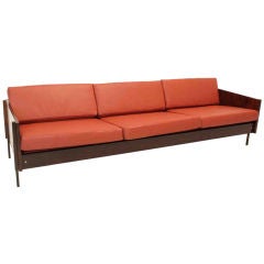 Vintage Elegant Rosewood and red leather sofa with bronze legs