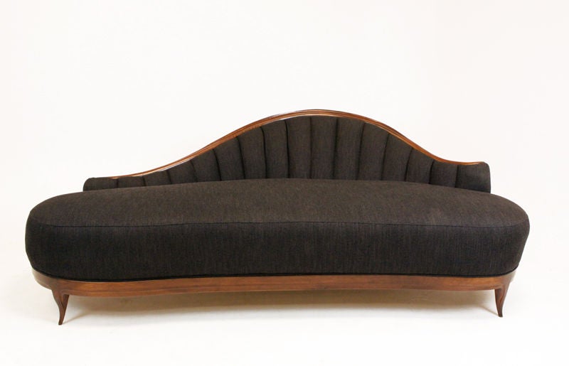 A vertically tufted Walnut chaise in charcoal fabric with sculptural feet designed by Ray Leach.<br />
<br />
We are pleased to present this exquisite collection of restored sculptural wood furnishings by little-known California designer Ray Leach.