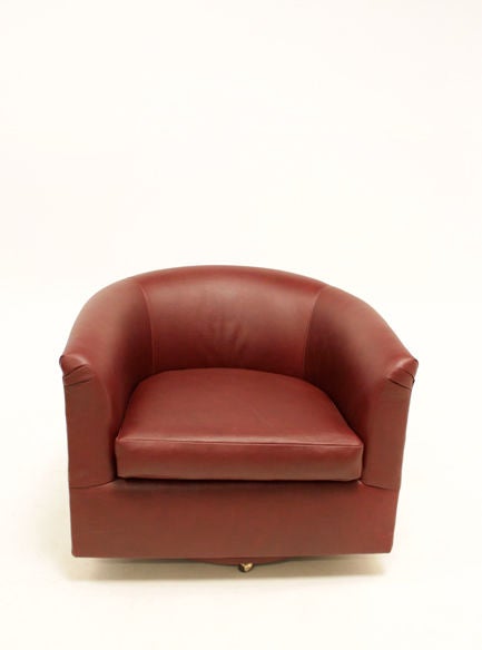 American Milo Baughman pair of leather rolling swivel tub chairs