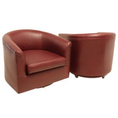 Milo Baughman pair of leather rolling swivel tub chairs