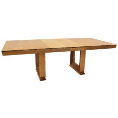 Oak dining table with combed wood bases by Paul Frankl