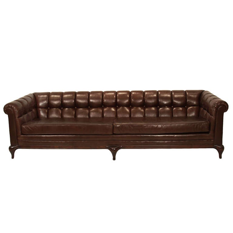 Monteverdi Young Tufted Dark Chocolate Leather Sofa At 1stdibs A Dark Chocolate Leather Sofa With Sculptural Walnut Base By Monteverdi Young The Elegantly